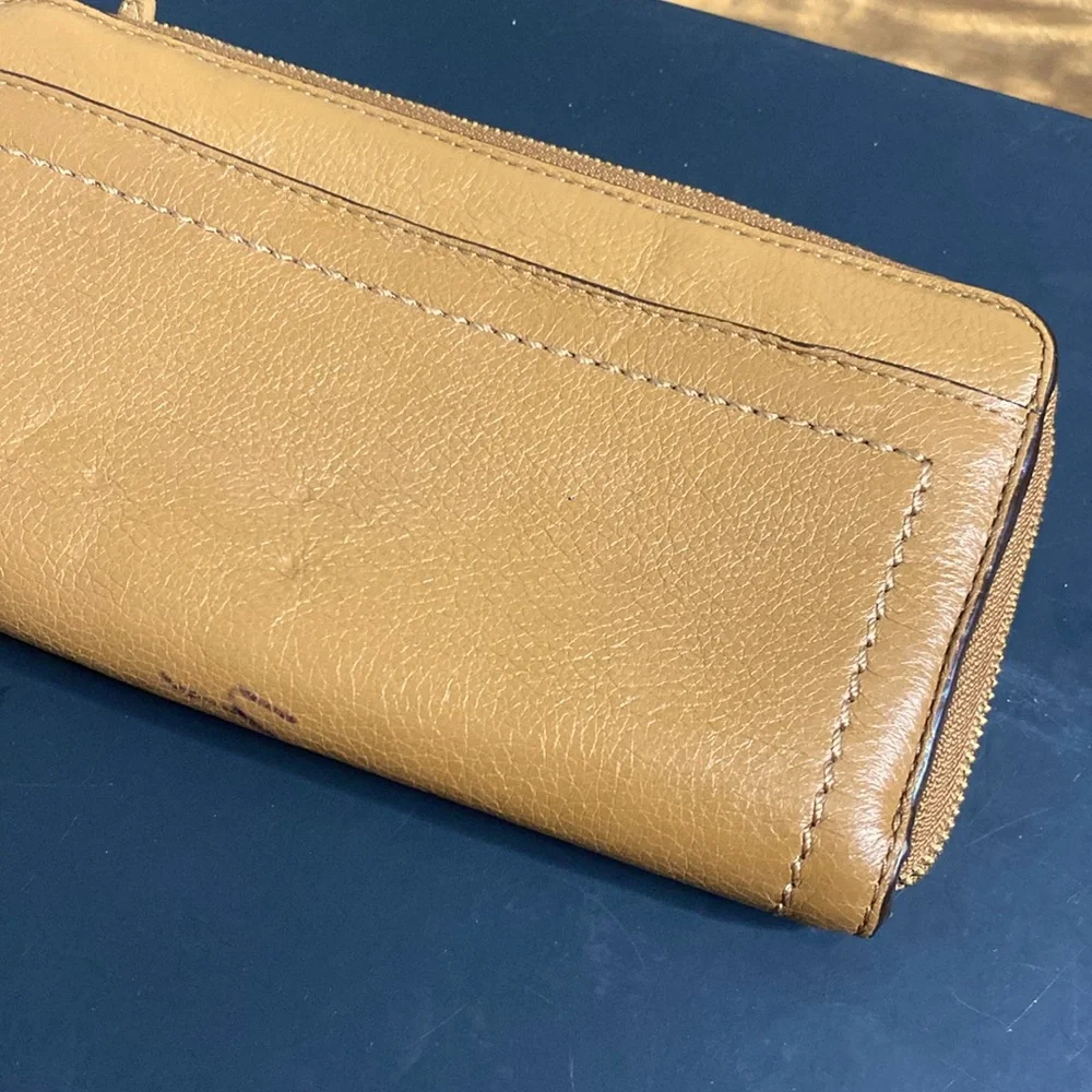 Coach stitched leather